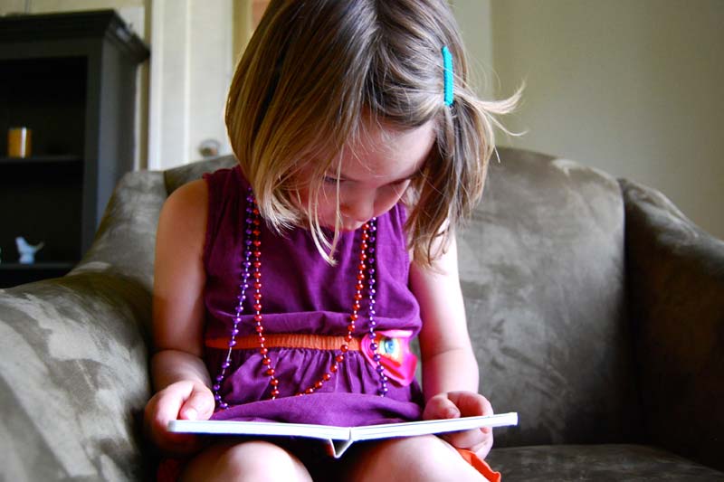 A child reading a book.